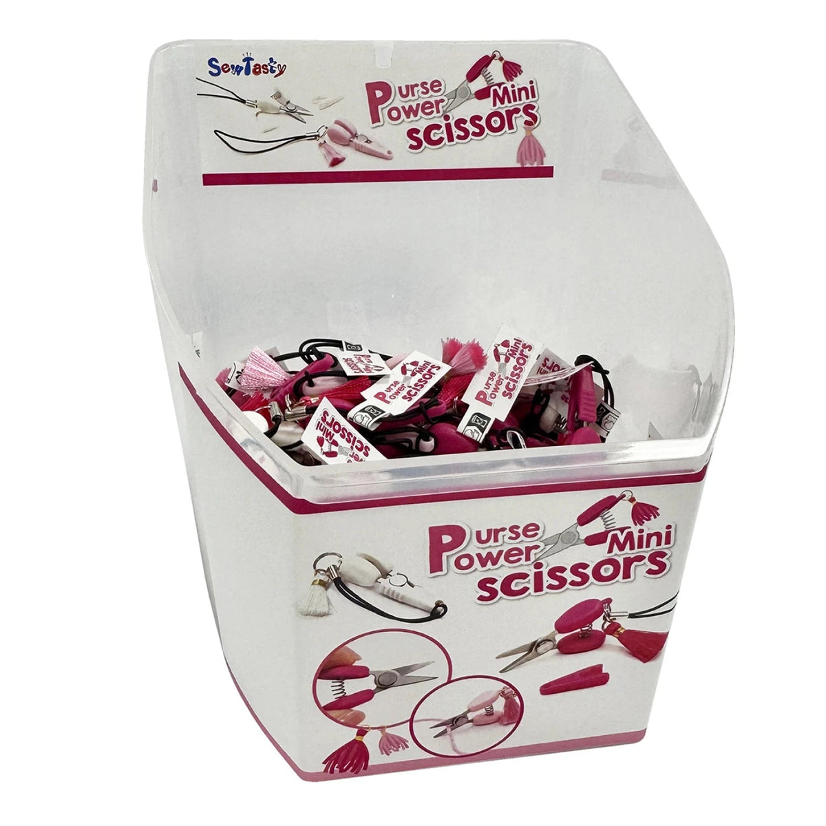 Carmon's Quilt Shop display bin filled with Sew Tasty Purse Power mini scissors featuring pink tassels and lanyards
