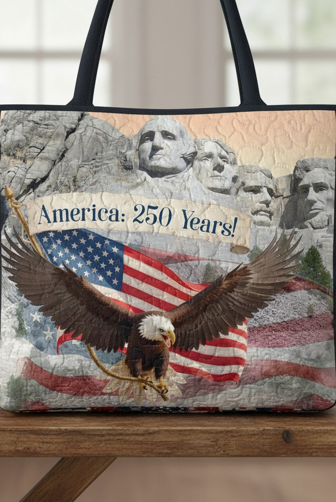 Carmon's Quilt Shop tote bag featuring a patriotic Mount Rushmore and bald eagle America 250 Years cotton fabric print.