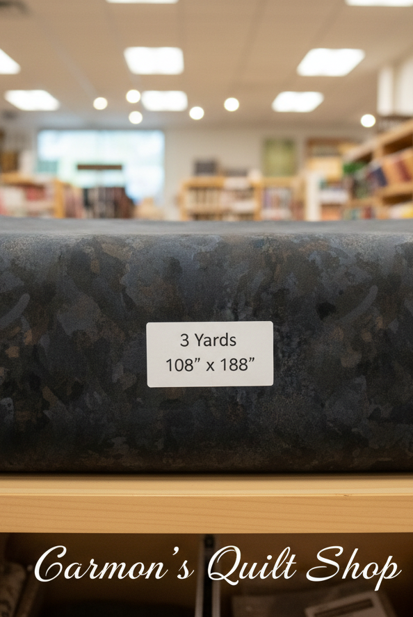 Carmon's Quilt Shop Chroma Obsidian black 108-inch wide cotton quilt backing fabric with a textured blender design.