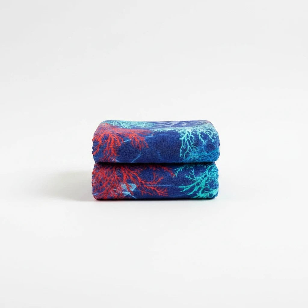 Carmon's Quilt Shop Oceana Coral 108 inch wide quilting fabric with orange and blue coral reef print on ocean blue
