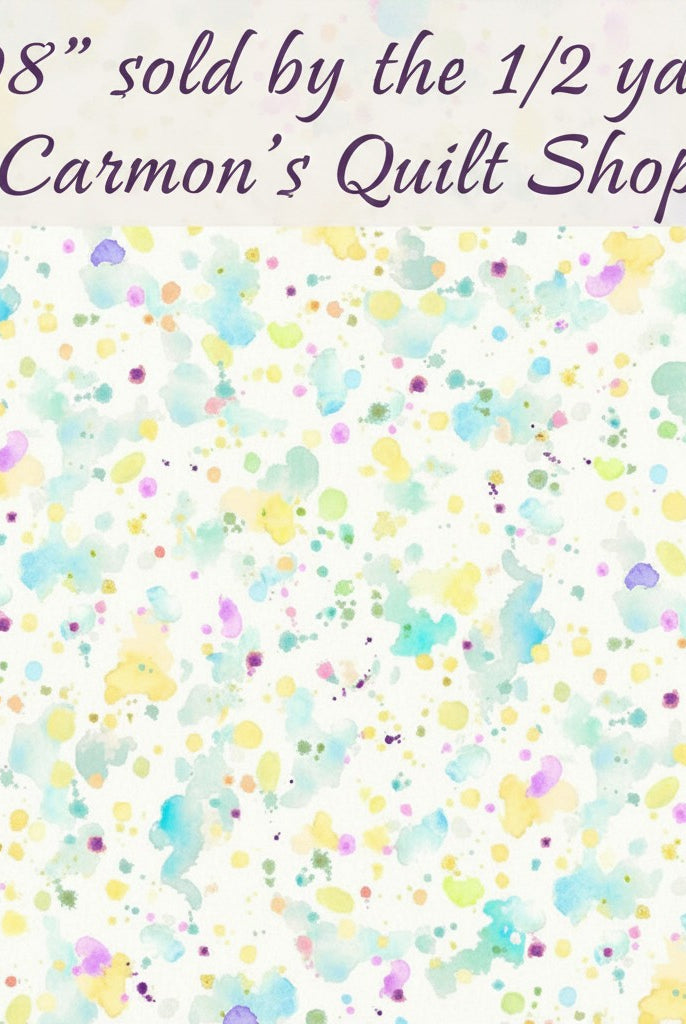 Carmon's Quilt Shop 108 inch wide cotton backing fabric featuring a colorful paint splatter design on a white background