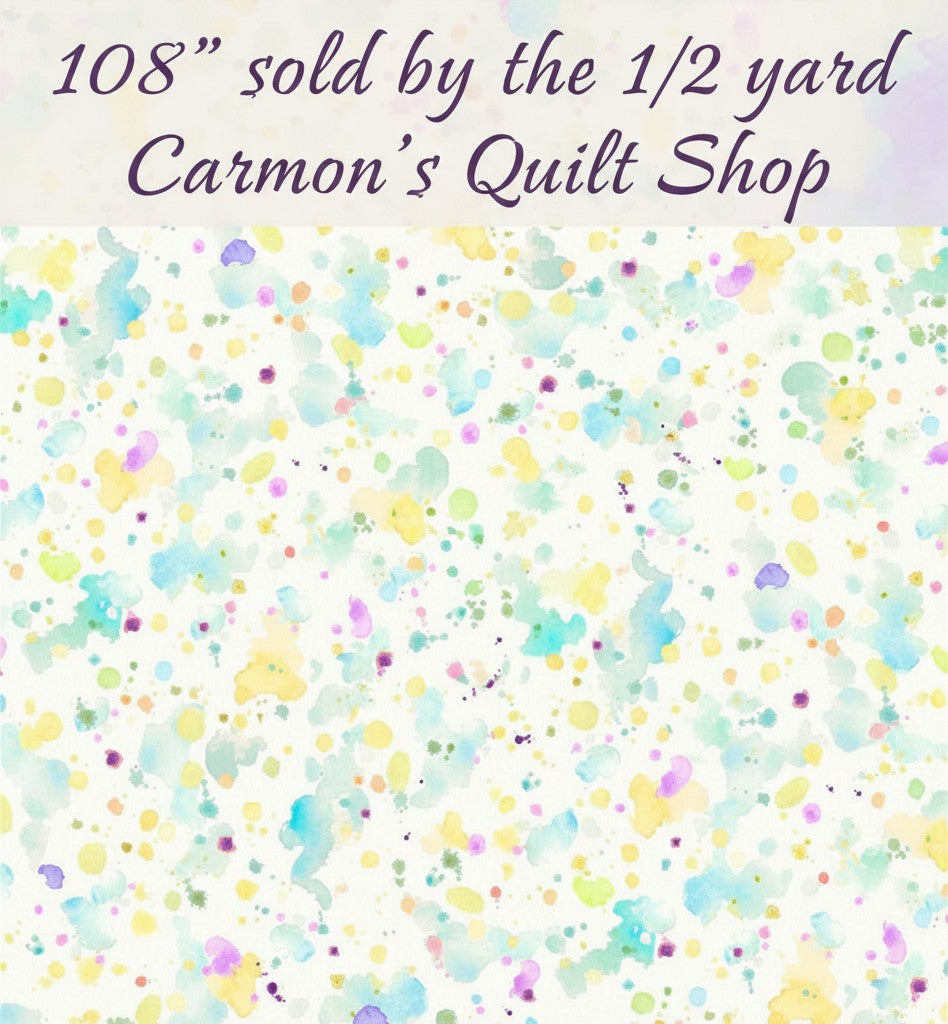 Carmon's Quilt Shop 108 inch wide cotton backing fabric featuring a colorful paint splatter design on a white background