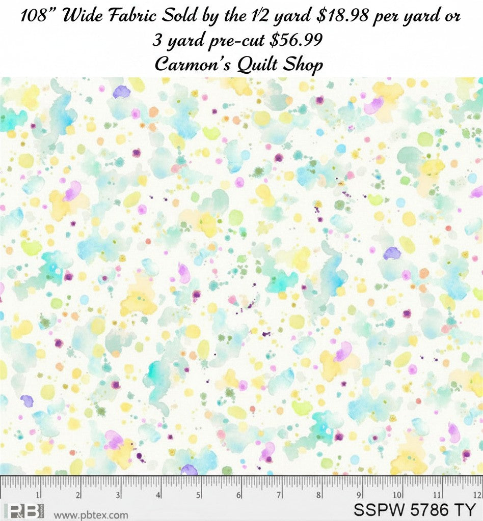 Carmon's Quilt Shop 108-inch wide cotton fabric with a colorful watercolor paint splatter pattern on white background