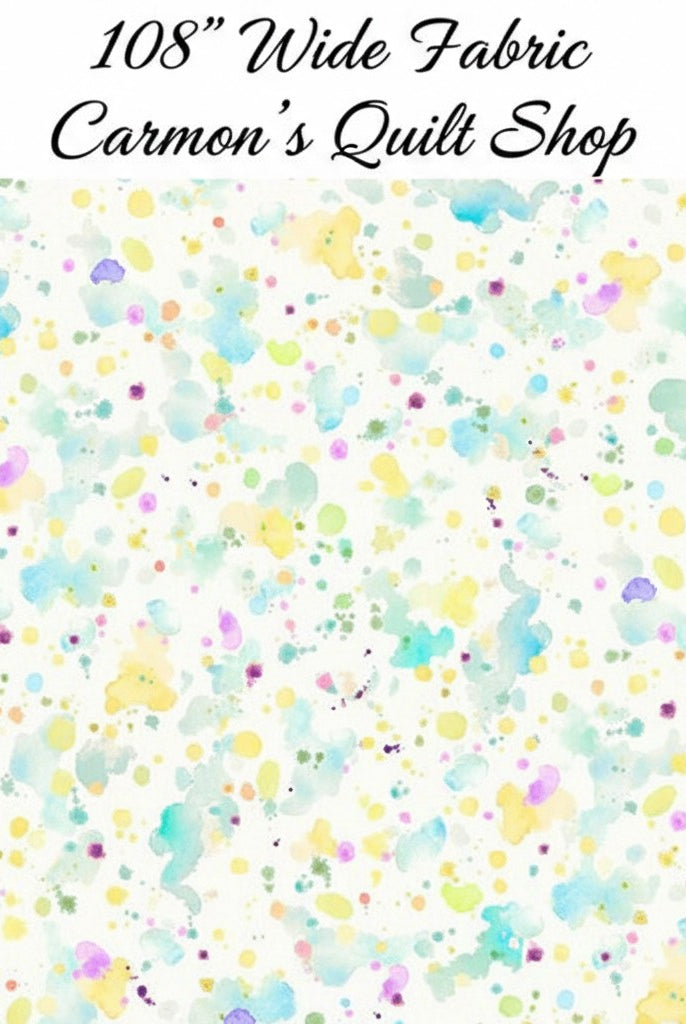 Carmon's Quilt Shop 108 inch wide cotton fabric featuring a colorful paint splatter pattern on a white background.