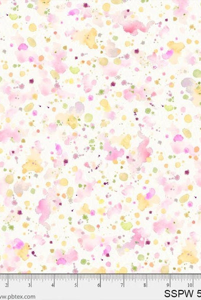 Carmon's Quilt Shop 108 inch wide cotton backing fabric featuring a colorful pink, yellow, and green paint splatter print.