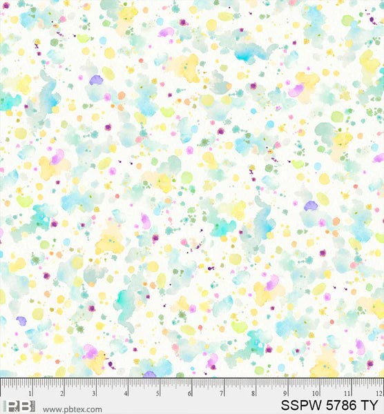 Carmon's Quilt Shop 108 inch wide cotton backing fabric with a colorful paint splatter pattern on a white background