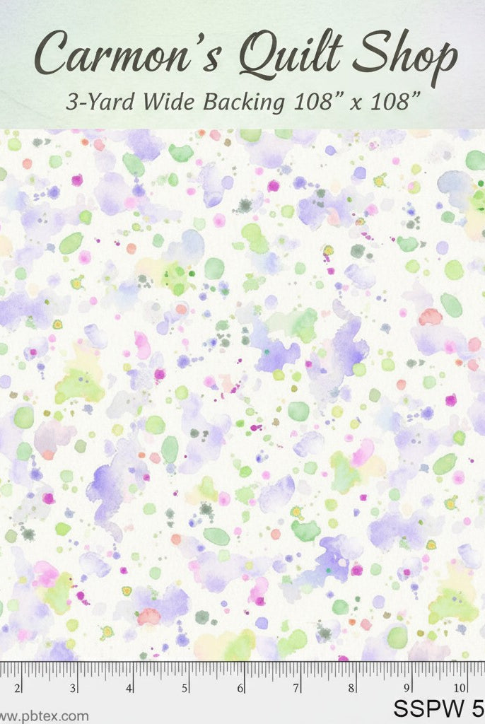 Carmon's Quilt Shop 108-inch wide cotton backing fabric featuring a colorful purple, green, and pink paint splatter print.