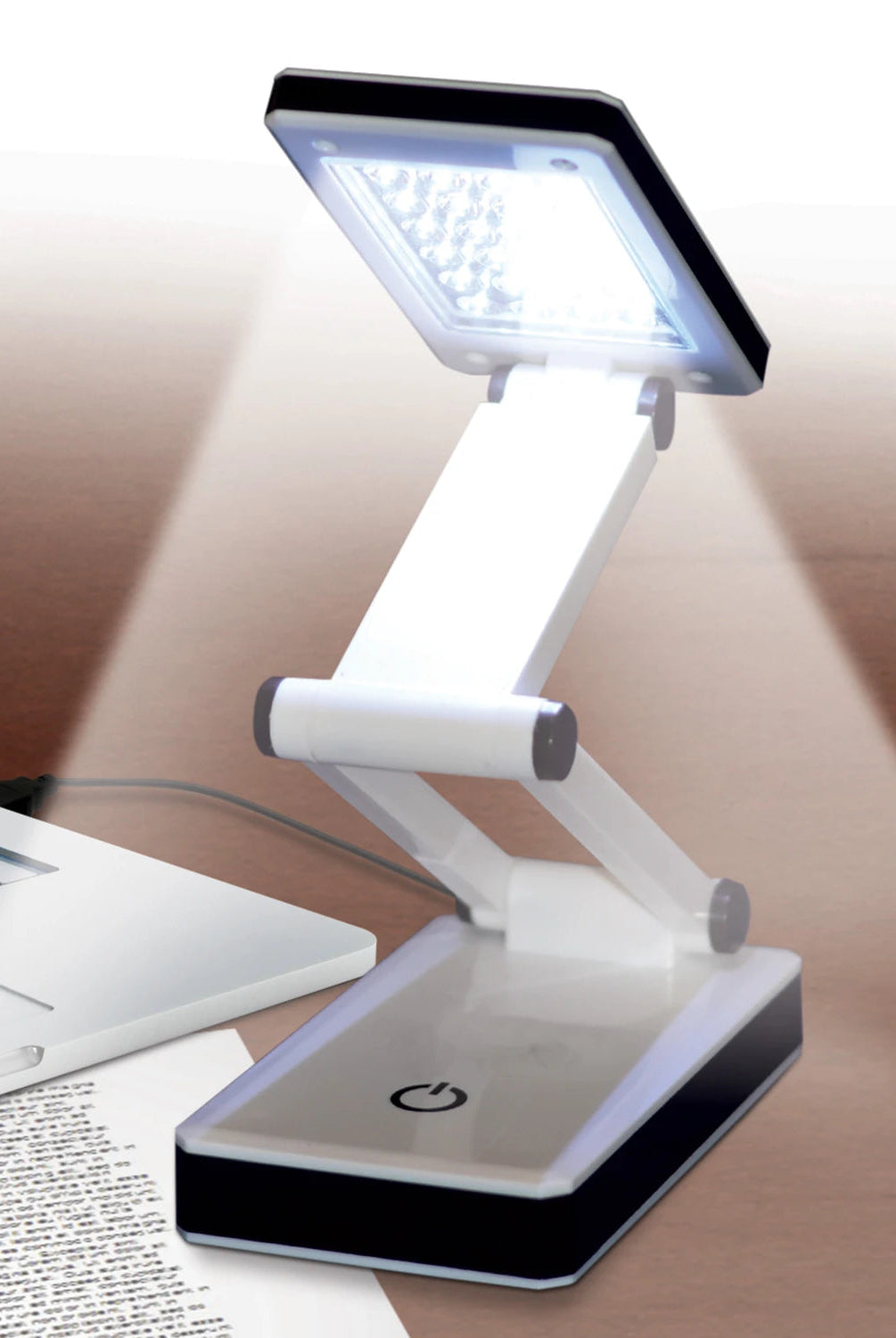 Carmon's Quilt Shop Frank A. Edmunds portable white and black LED lamp with adjustable brightness for crafting.