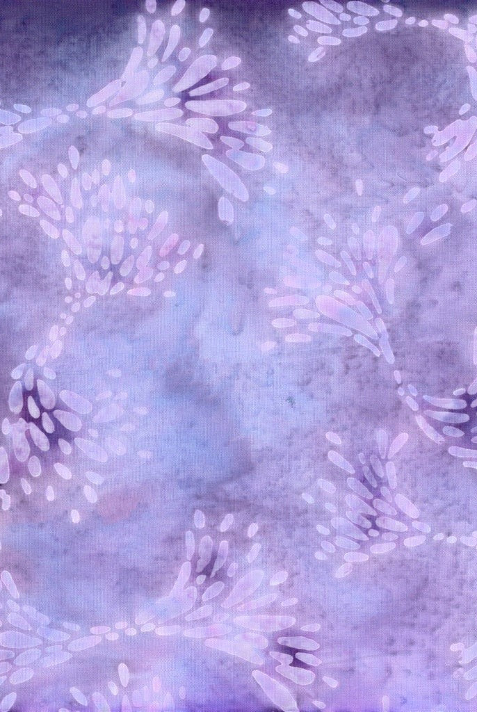 Carmon's Quilt Shop purple and light purple batik cotton fabric with a delicate floral-inspired pattern