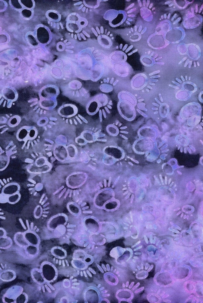 Carmon's Quilt Shop Island Batik Vintner's Treasure purple and black cotton fabric with a unique paw print pattern