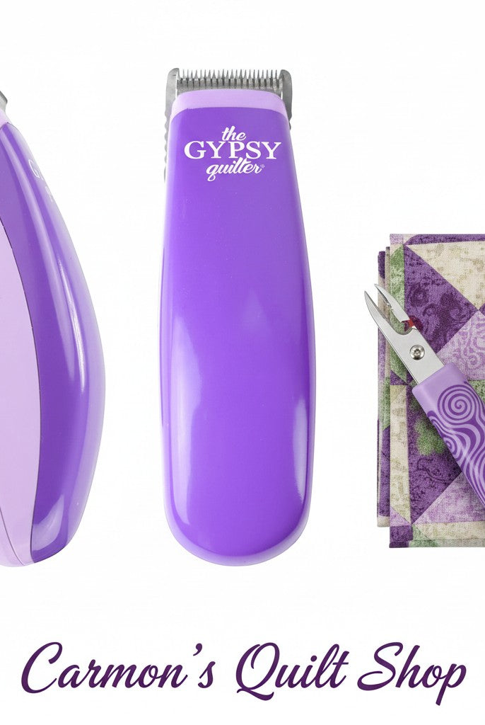 Carmon's Quilt Shop purple battery-operated thread shaver and seam ripper tool set for quilting and sewing projects.