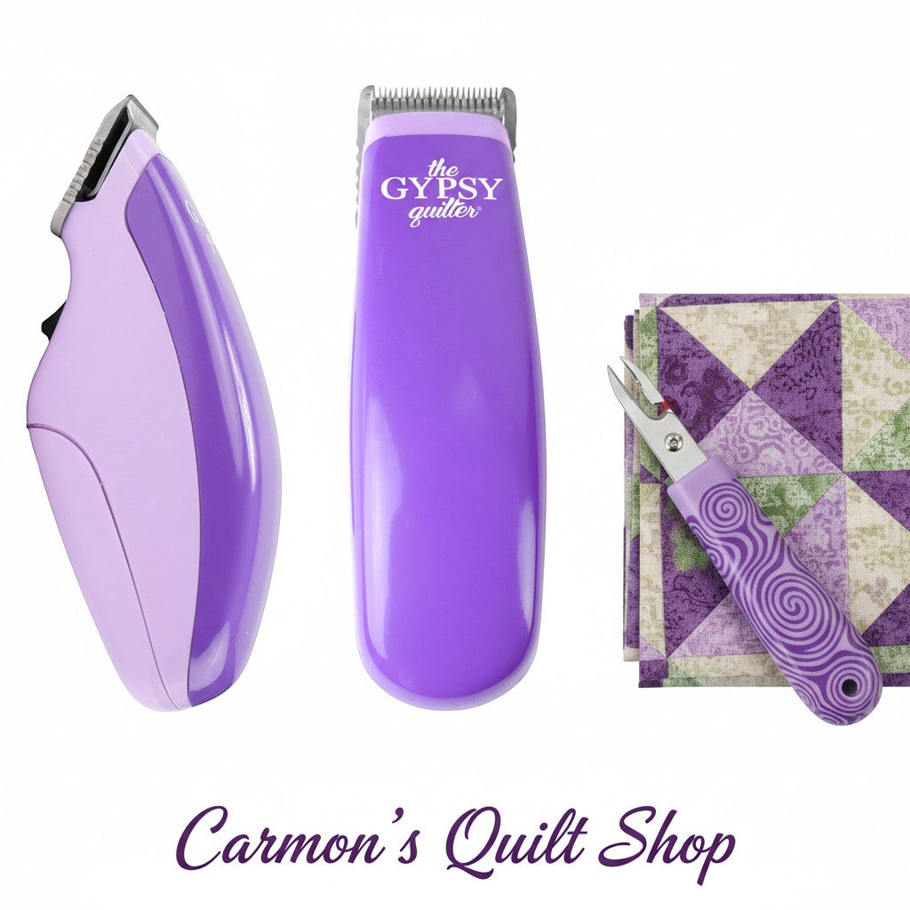 Carmon's Quilt Shop purple battery-operated thread shaver and seam ripper tool set for quilting and sewing projects.
