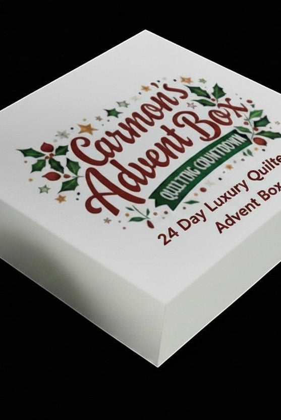 Carmon's Quilt Shop 24-day luxury quilting advent box with festive holiday branding on a white gift box.