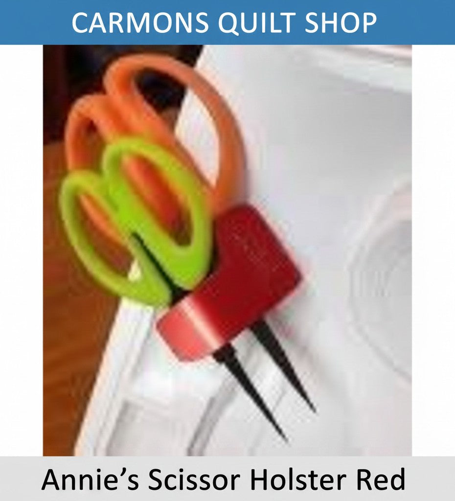 Carmon's Quilt Shop red Annie's Scissor Holster with two slots holding scissors attached to a sewing machine