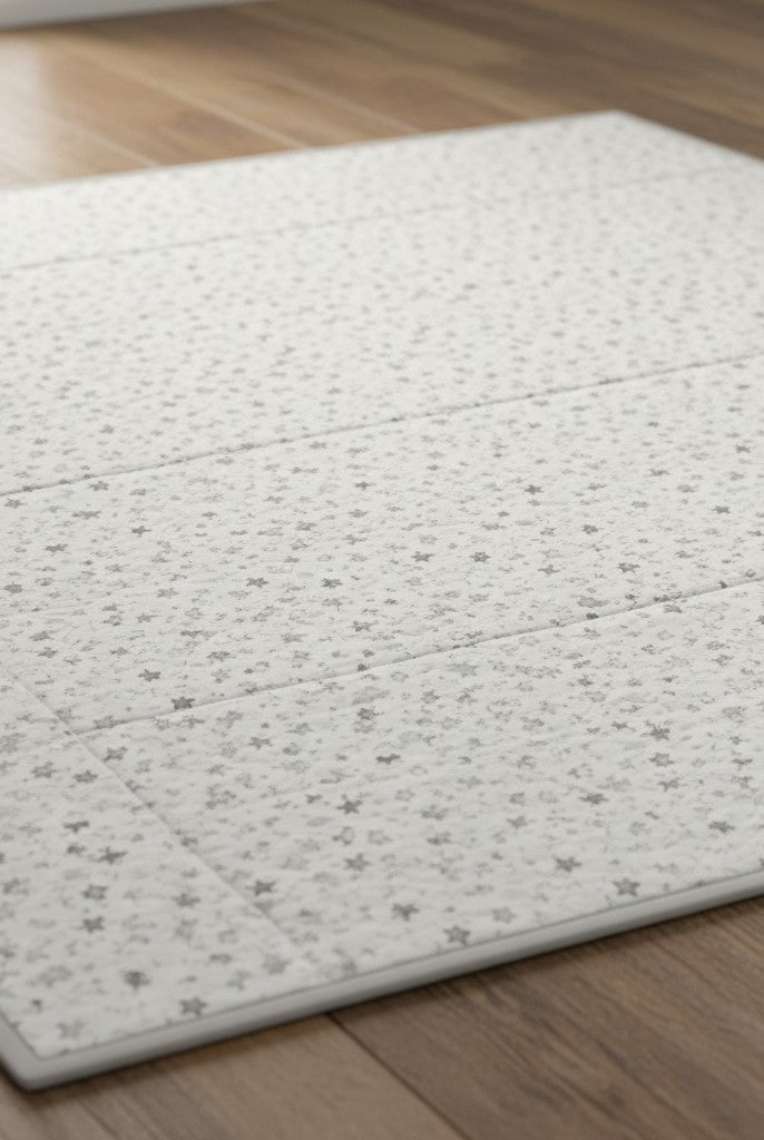Carmon's Quilt Shop Soaring Dreams white stars fabric, 100% cotton, gray-blue hue, ideal for quilting projects.