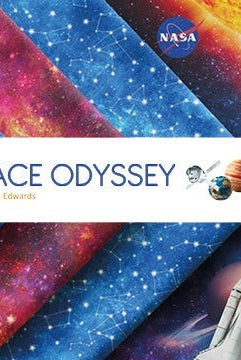 Carmon's Quilt Shop Space Odyssey fabric panel featuring NASA imagery, planets, stars, and a space shuttle design.