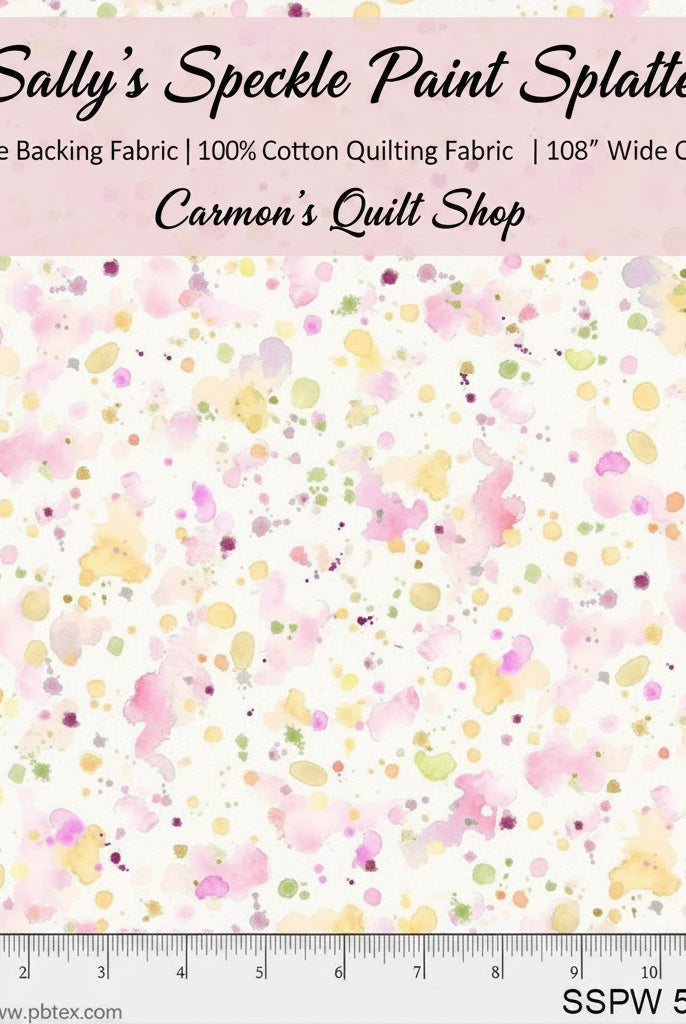 Carmon's Quilt Shop 108-inch wide cotton fabric featuring a colorful paint splatter pattern on a white background.