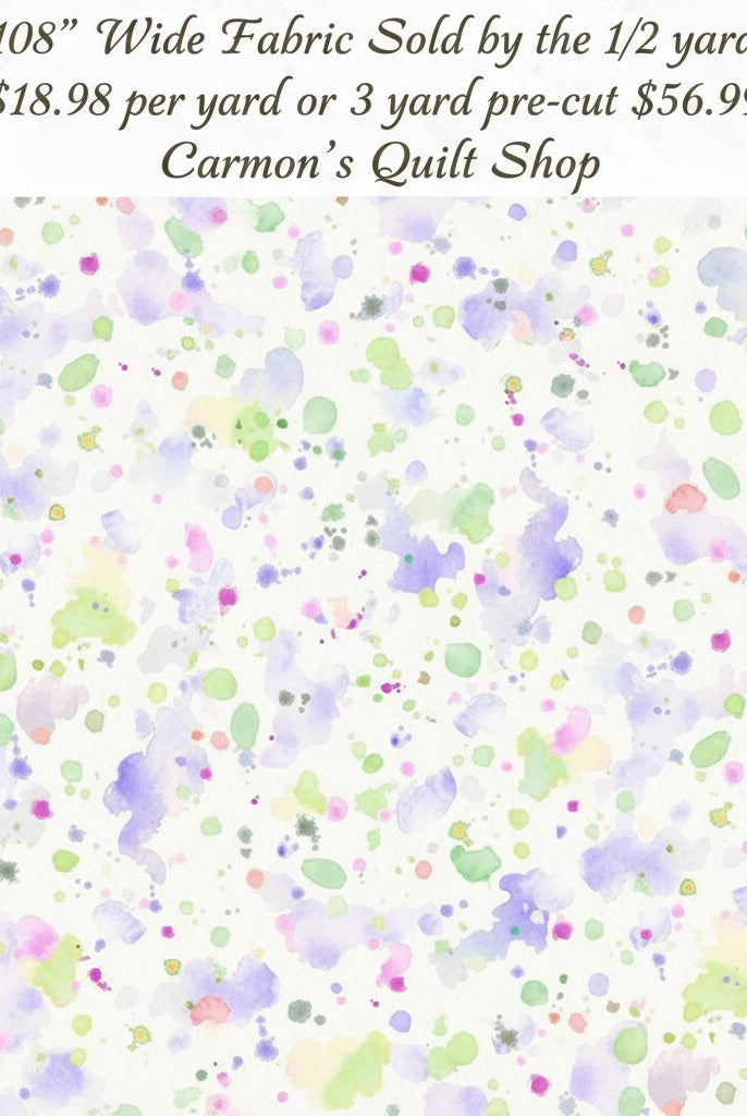 Carmon's Quilt Shop 108 inch wide cotton backing fabric featuring a colorful paint splatter pattern on white