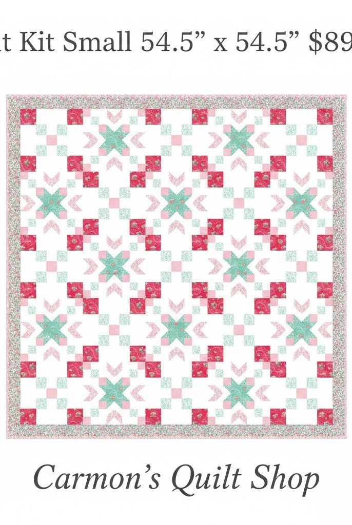 Carmon's Quilt Shop Starry-Eyed floral quilt kit in pink and green 100% cotton fabric with a geometric star pattern.