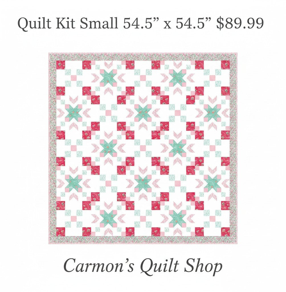 Carmon's Quilt Shop Starry-Eyed floral quilt kit in pink and green 100% cotton fabric with a geometric star pattern.