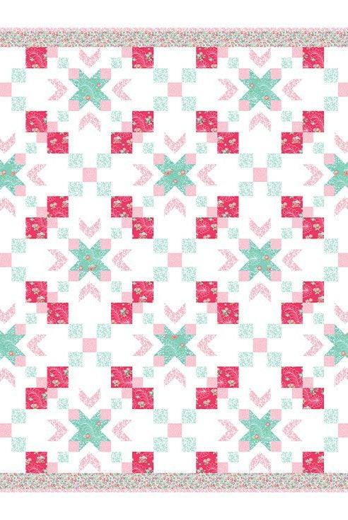 Carmon's Quilt Shop Starry-Eyed quilt kit featuring floral pink and teal 100% cotton fabric in a geometric star pattern.