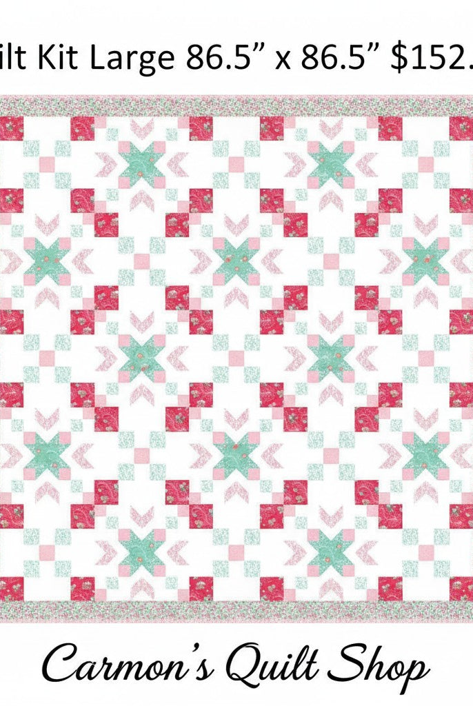 Carmon's Quilt Shop Starry-Eyed floral quilt kit in pink and teal 100% cotton fabric with a geometric star pattern.