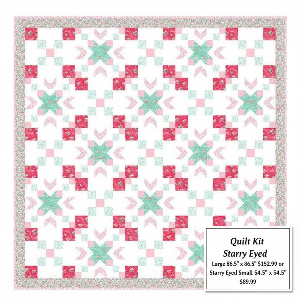 Carmon's Quilt Shop Starry-Eyed quilt kit featuring floral Northcott cotton fabrics in pink, green, and white.
