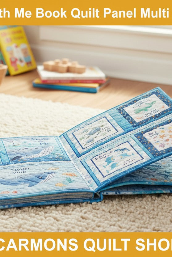 Child reading a soft fabric book made from the Carmon's Quilt Shop Swim with Me underwater themed quilt panel