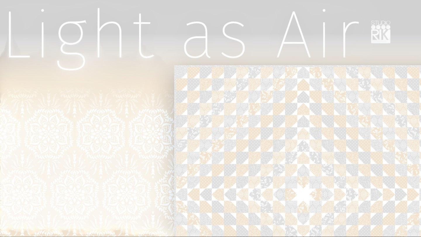 Carmon's Quilt Shop Robert Kaufman Light As Air white 100% cotton quilting fabric with an elegant airy pattern.