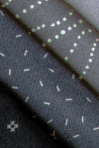 Collection of fabric swatches with various patterns