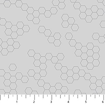 Hexagonal pattern on a gray background with a ruler at the bottom.