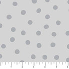 Gray polka dots on a light gray background with a ruler at the bottom.
