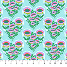 Pattern of colorful floral designs on a blue background with a ruler at the bottom.