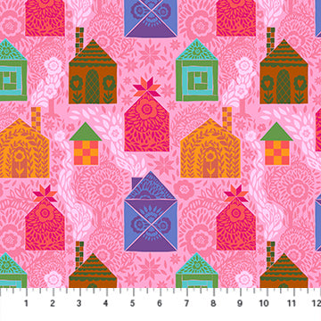 Patterned fabric with colorful houses on a pink background