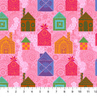 Patterned fabric with colorful houses on a pink background