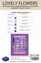 Quilt pattern packaging with fabric requirements and a sample quilt design.