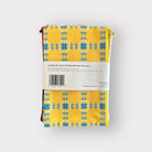 Packaged product with yellow and blue pattern on a white background