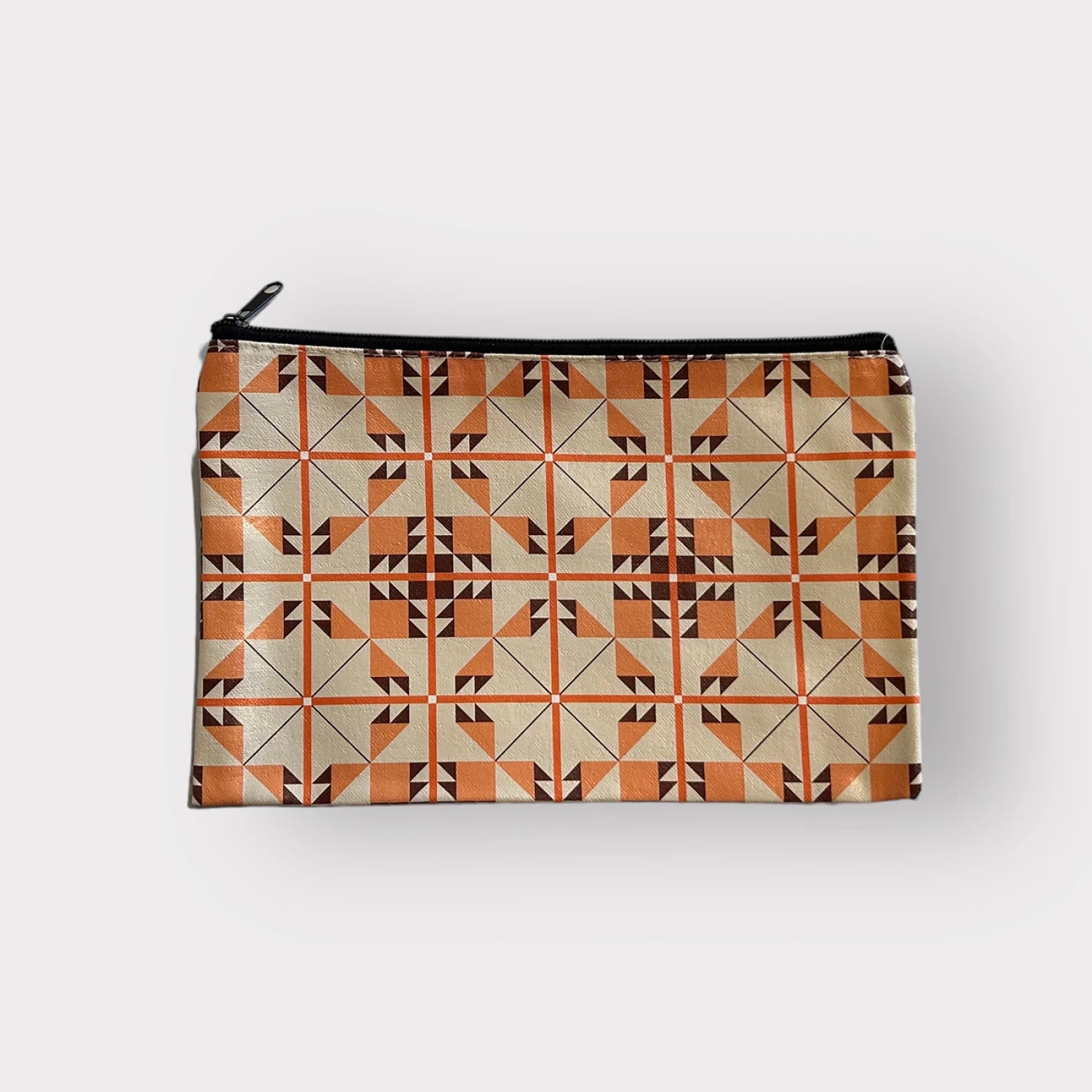 Pouch with geometric pattern on a white background