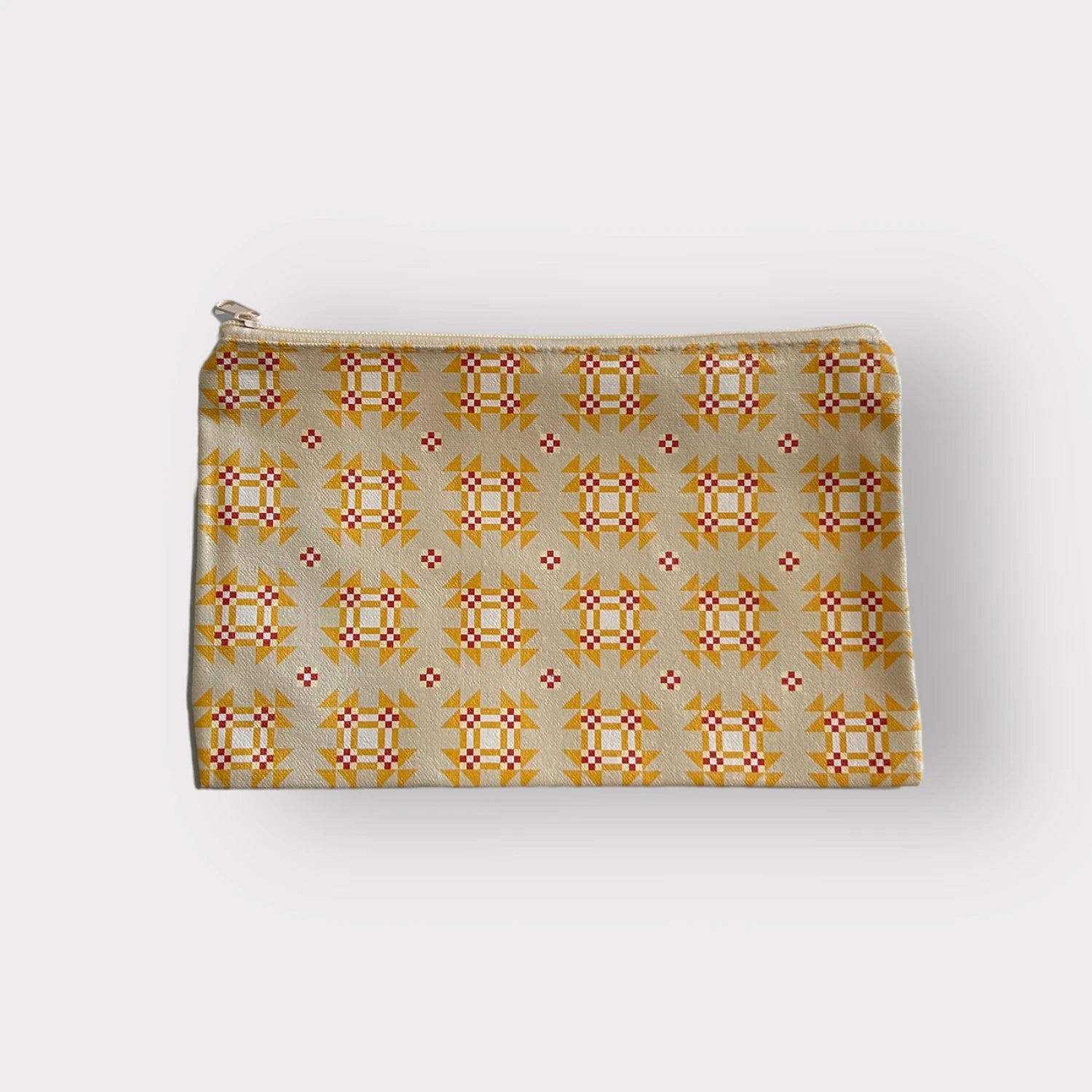 Patterned pouch with a zipper on a white background