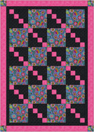 Quilt with floral patterns and pink borders on a black background
