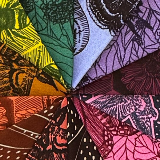 Colorful patterned fabric swatch with various designs