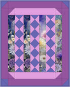 Quilt with purple and blue diamond pattern surrounded by floral background