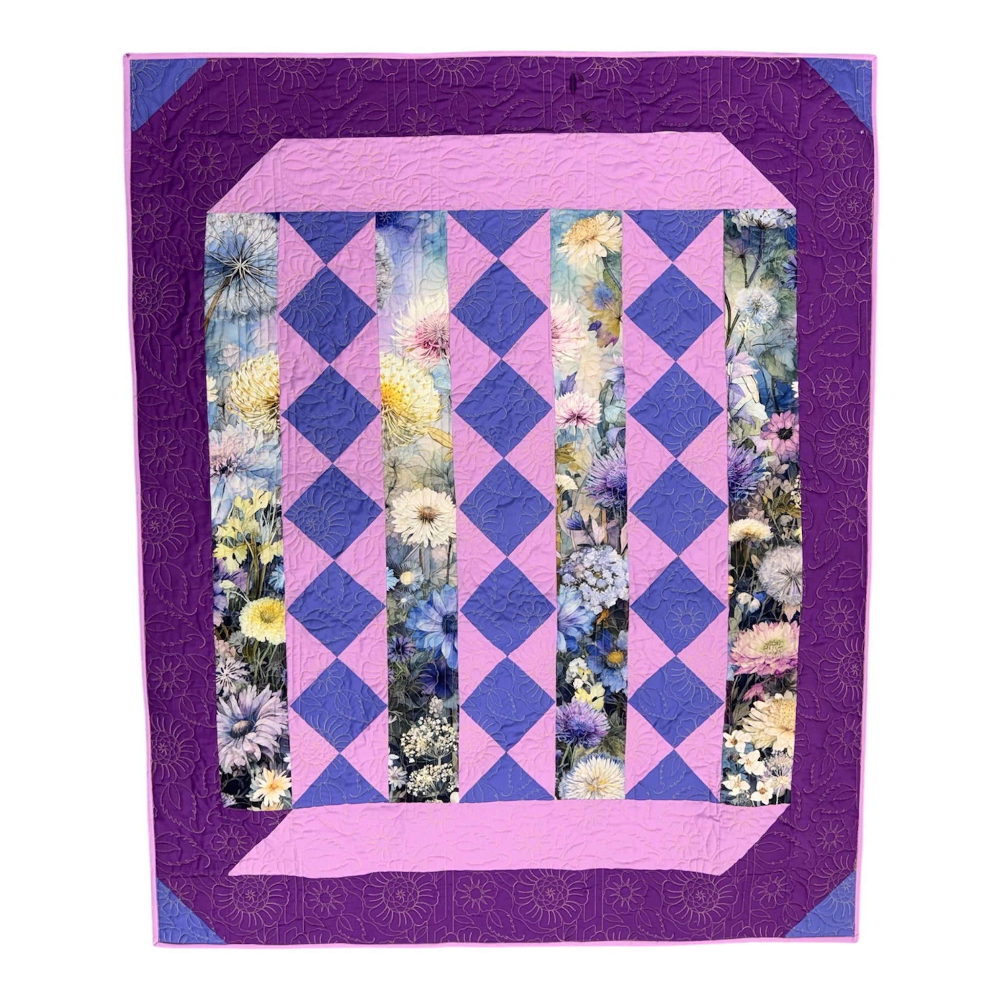 Quilt with purple and pink diamond pattern and floral border on a white Lovely Flowers Quilt Kit Finished Size - Northcott/Timeless Treasures Fabric 49.75" x 60" -Carmons Quilt Shopbackground