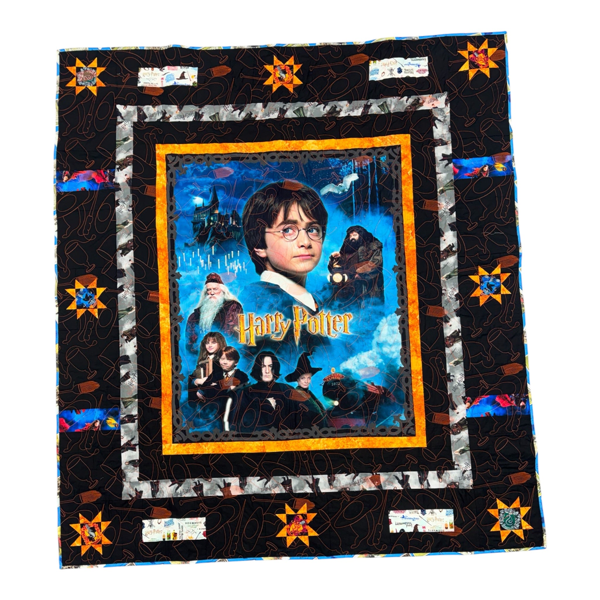 Harry Potter-themed quilt with characters and text on a black background