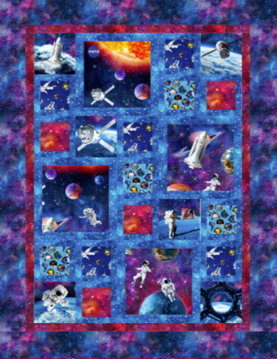 Quilt with space-themed blocks featuring astronauts, planets, and rockets on a blue and purple background. Carmon's Quilt Shop