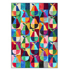 Colorful quilt with geometric pear pattern on a white background Carmon's Quilt Shop