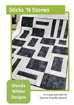 Book cover of 'Sticks 'N Stones' by Quilts of Winter Designs with black and white pattern Sticks N Stones Pattern - Moderns Quilt Pattern Multiple Size Variations - Carmon's Quilt Shop
