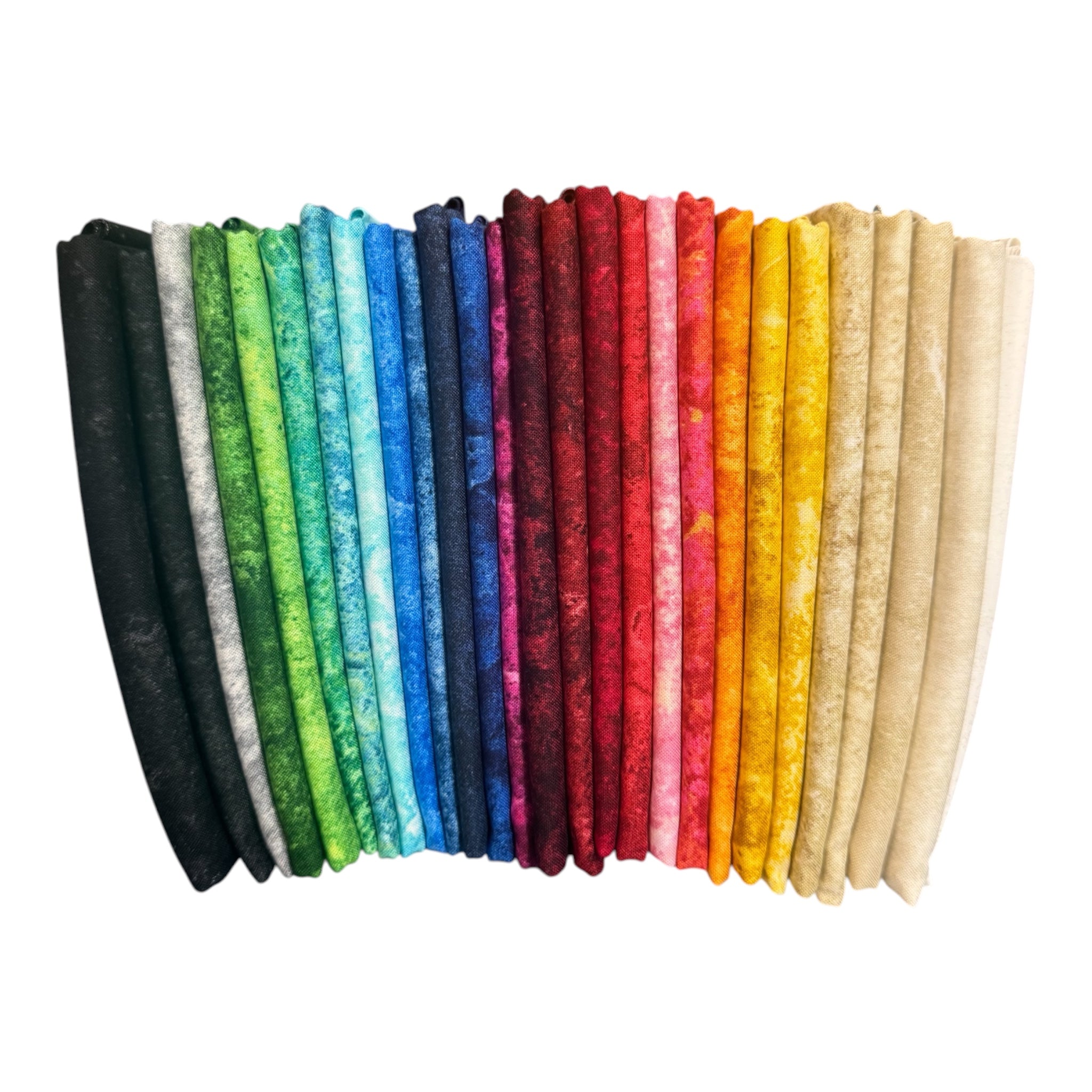 Set of colorful fabric strips arranged in a row on a white Stonehenge Basics 1/2 Yard Bundle Northcott Carmon's Quilt Shopbackground