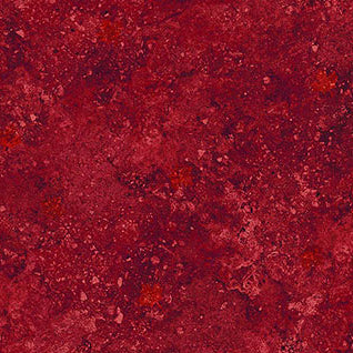 Red textured fabric with a ruler at the bottom for scale Stonehenge Basics Red 3954-190 Northcott Carmon's Quilt Shop