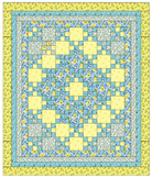 Quilt with yellow and blue patterned squares Sunny Skies Quilt Kit - Riley Blake Fabrics - Finished Size 59" x 71" - Carmon's Quilt Shop